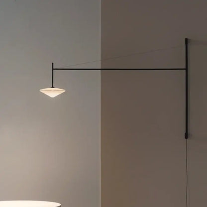 Minimalist decorbites black iron led long wall lamp with frosted glass shade emitting warm light for living room use