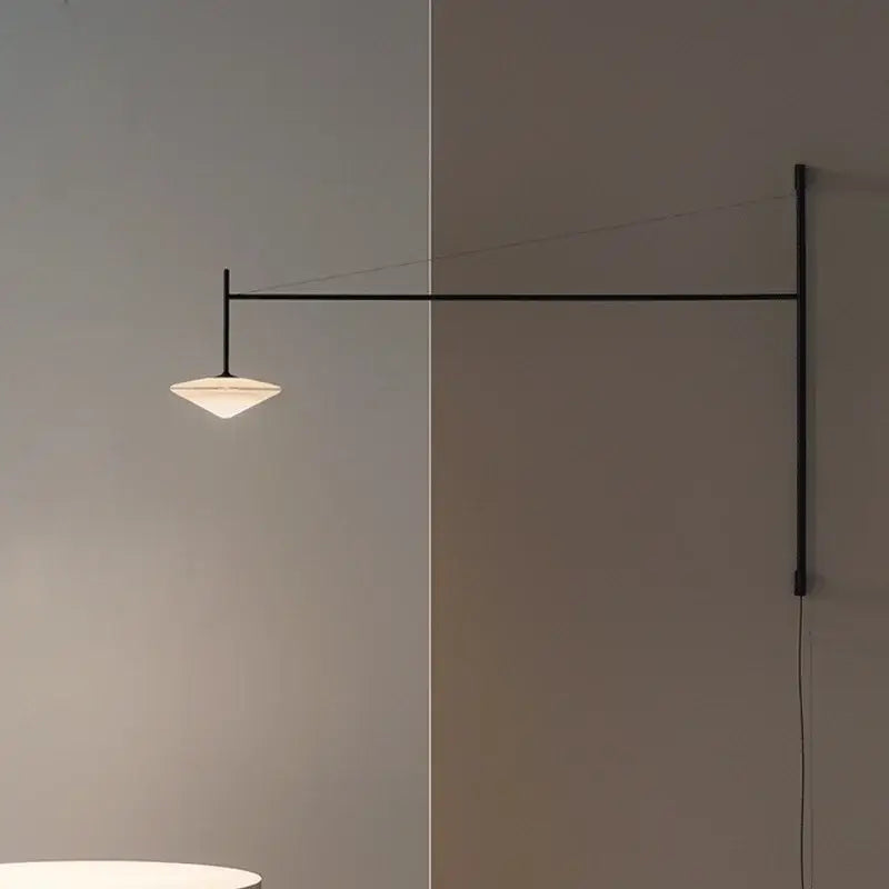 Minimalist decorbites black iron led long wall lamp with frosted glass shade emitting warm light for living room use