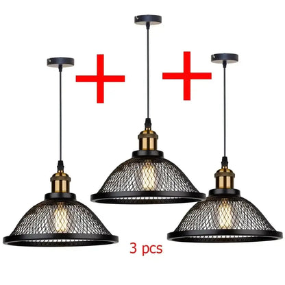 Set of three decorbites black iron pendant lights with brass accents and wire mesh shades for kitchen or living room
