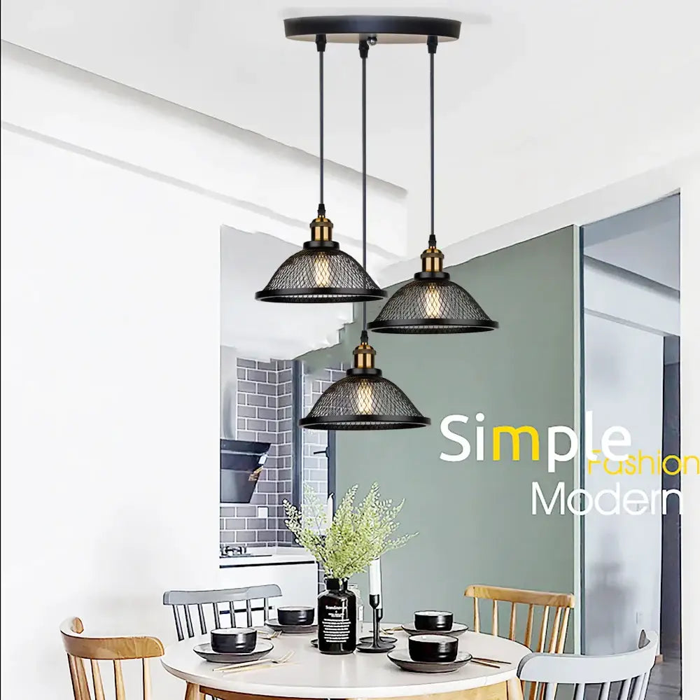 Decorbites black iron net-cage pendant light fixture with mesh shades and brass accents hanging from ceiling fixture