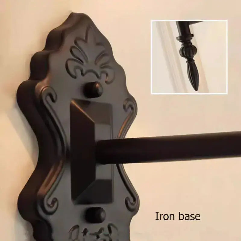 Dark bronze ornate iron wall-mounted curtain rod base with scrollwork for decorbites black iron wall lamp fixture