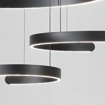 Modern black led chandelier pendant light by decorbites with sleek circular design for foyer stairs and bar lighting
