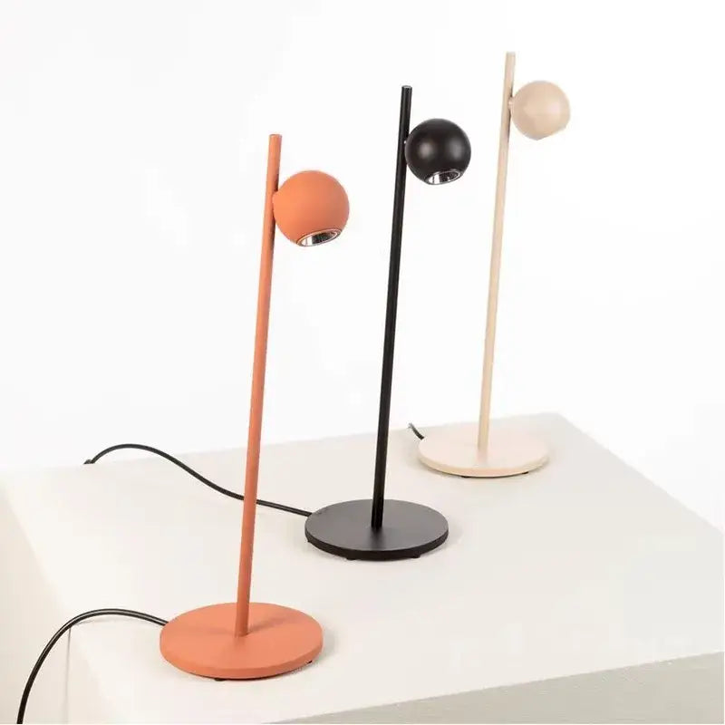 Modern minimalist floor lamps with matte orange black and beige spherical heads complement decorbites black led floor lamp design