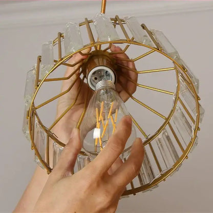 Gold-toned pendant chandelier with clear crystal rectangular accents and edison bulb for DecorBites black led pendant design