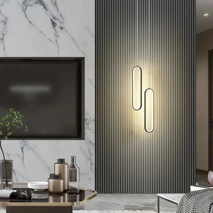 Modern minimalist decorbites black led pendant light with sleek oval shapes and warm led illumination for bedrooms