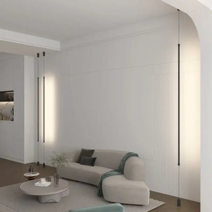 Modern minimalist decorbites black led pendant light with sleek black rods and warm diffused illumination for living rooms