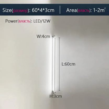 A sleek decorbites black led wall lamp with a minimalist white cylindrical design and slim profile for modern interiors