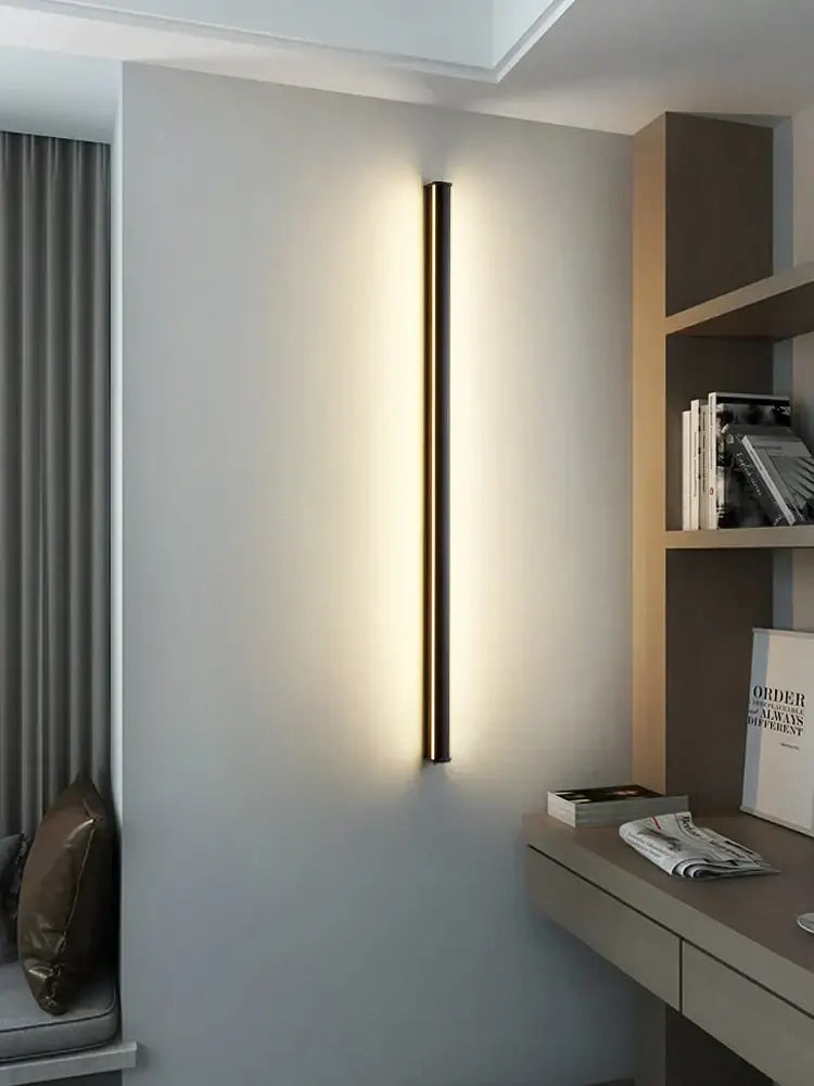 Modern minimalist decorbites black led wall lamp with sleek slender design and warm ambient lighting for living room
