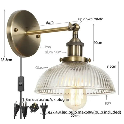 DecorBites black led wall lamp with antique brass finish, ribbed glass shade, and adjustable arm bedside sconce