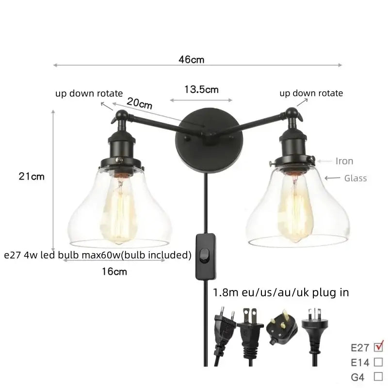 Black iron DecorBites black LED wall sconce with two adjustable arms and clear glass shades for bedroom or bathroom mirror