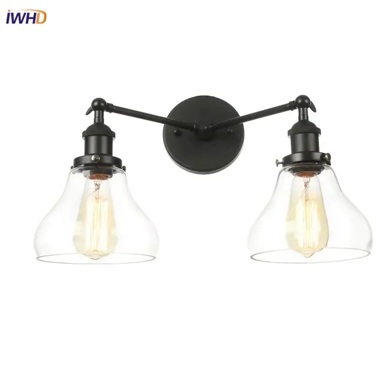 DecorBites black led wall sconce with two black wrought iron arms and clear glass bell-shaped shades for bedroom bathroom mirror