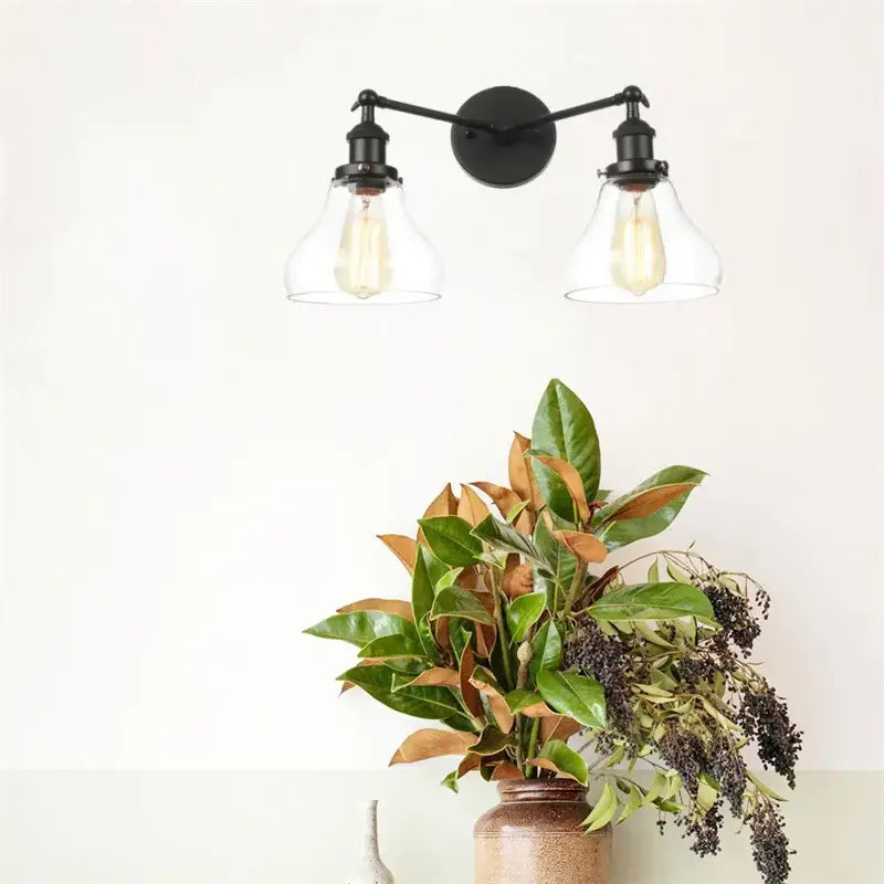 Black wrought iron decorbites black led wall sconce with two clear glass shades and exposed filament bulbs for bedroom bathroom mirror