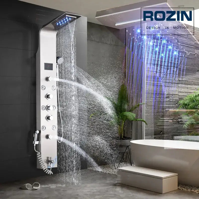 Silver rozin shower panel with multiple spray settings and blue led lighting in decorbites black led waterfall design