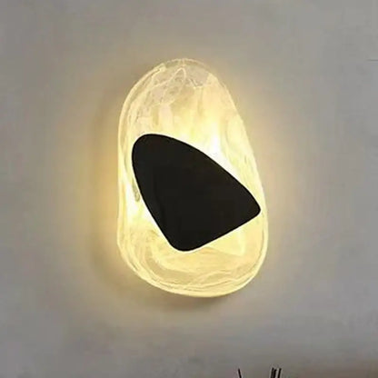 Warm translucent glass decorbites black luxury wall light with smooth organic shape and black luxury led accent