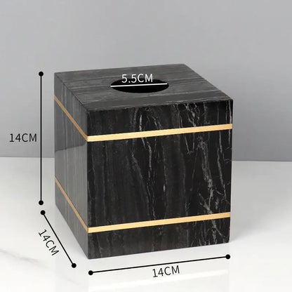 Decorbites black marble tissue box with gold accent stripes in a black marble bathroom accessories set