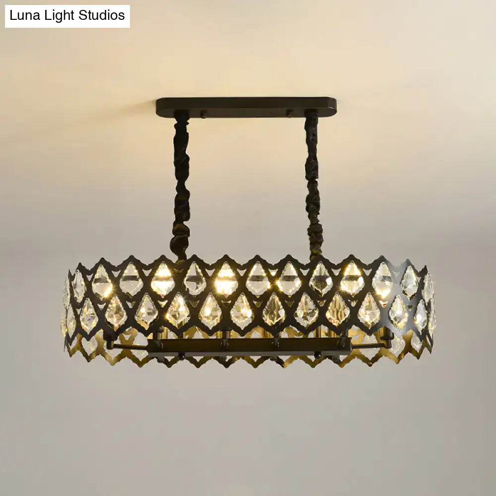 A vintage-inspired dark bronze island pendant with intricate lattice and clear crystal teardrops for 220v-240v use