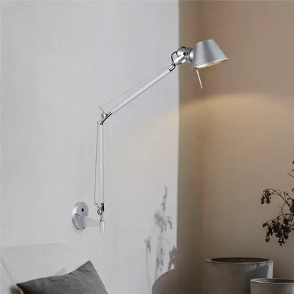 Silver articulated decorbites black silver rotatable wall light with sleek adjustable arm and conical shade for study office