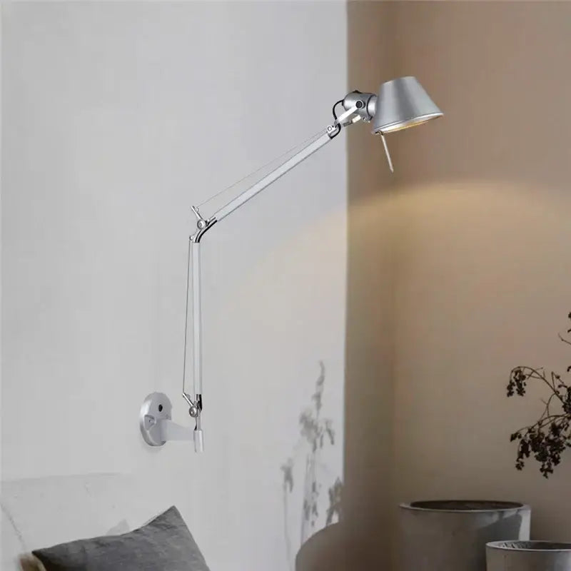 Silver articulated decorbites black silver rotatable wall light with sleek adjustable arm and conical shade for study office
