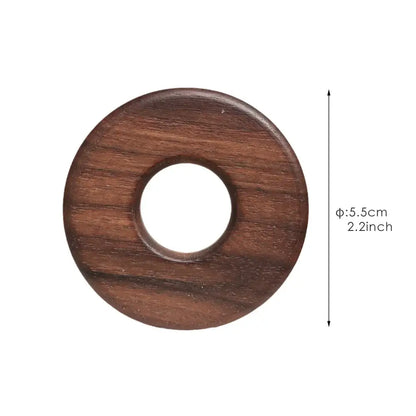 Dark brown wooden decorbites black walnut donuts bag clips with smooth polished finish and visible grain patterns