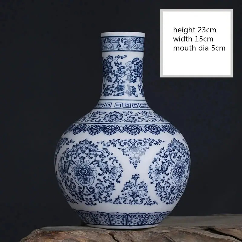 DecorBites ceramic vase with blue and white floral patterns for elegant home decor featuring a slender neck and rounded body