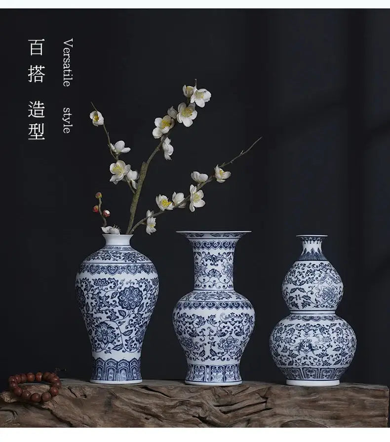 Three elegant blue and white ceramic vases with intricate floral patterns for stylish home decor by DecorBites™