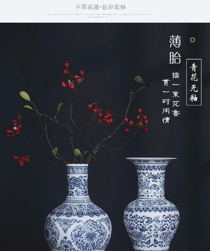 Two elegant blue and white ceramic vases with intricate floral patterns for sophisticated home decor by decorbites