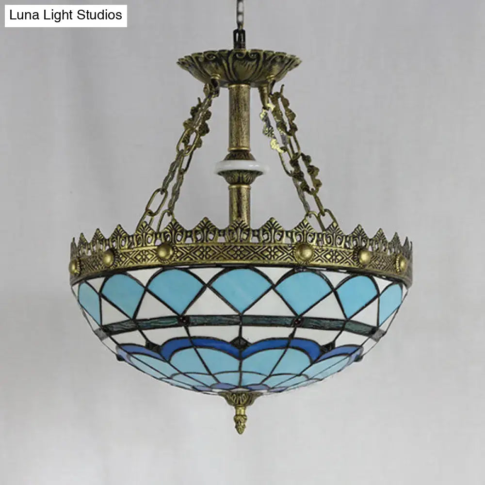 Antique brass-finished decorbites pendant light with baroque bowl stained glass shade in blue and white scalloped design