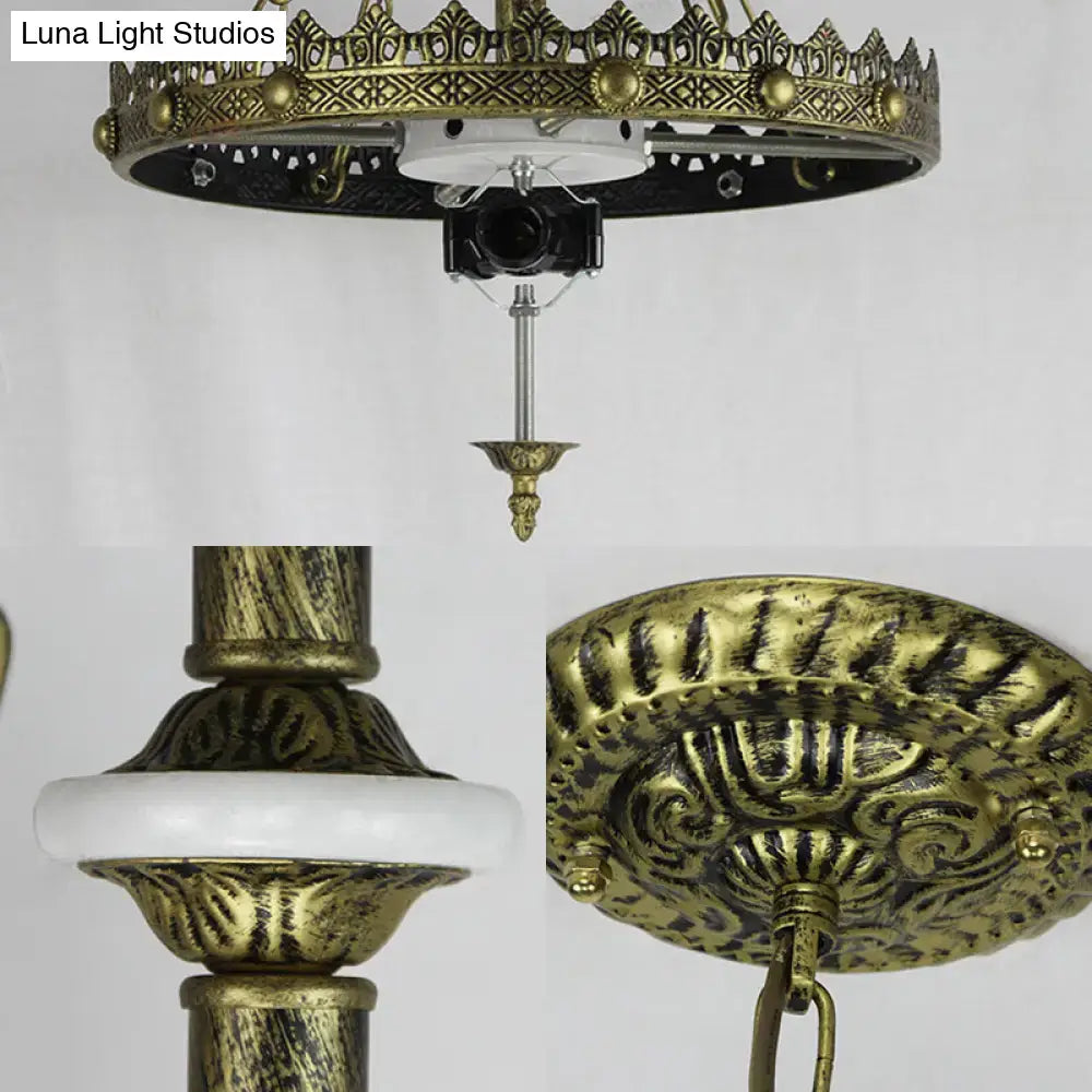 Antique brass ornate ceiling fixture with intricate filigree and white marble accent for baroque bowl pendant light