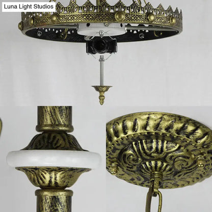 Antique brass ornate ceiling fixture with intricate filigree and white marble accent for baroque bowl pendant light