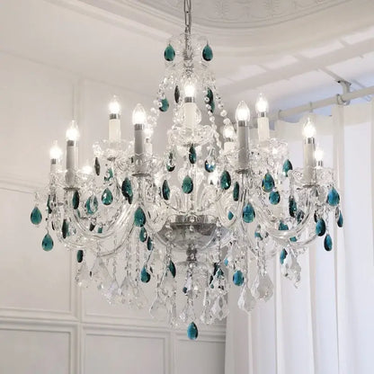 Elegant decorbites blue crystal chandelier featuring teal teardrop accents and clear glass prisms for living room lighting
