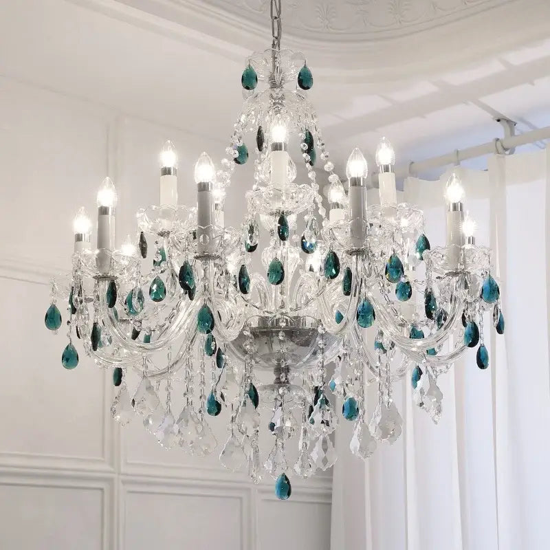 Elegant decorbites blue crystal chandelier featuring teal teardrop accents and clear glass prisms for living room lighting