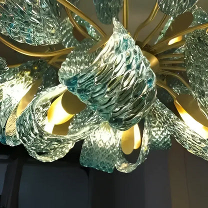 Decorbites™ blue glass led pendant lamps featuring a translucent teal glass chandelier with leaf-like arms and golden frame