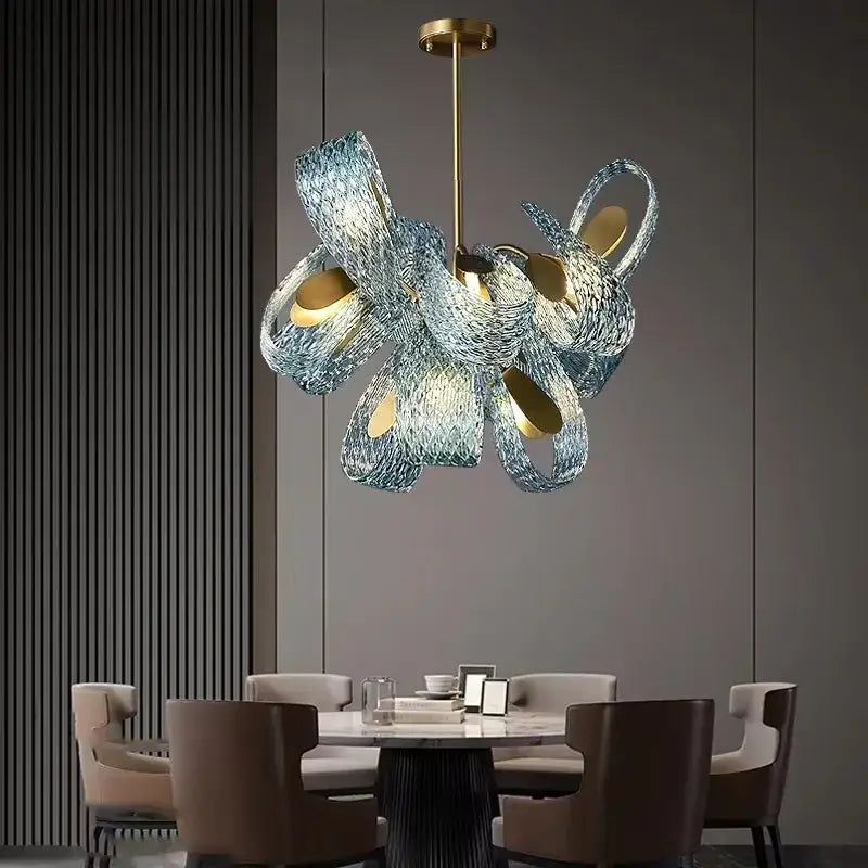 DecorBites blue glass LED pendant lamps feature modern sculptural design with intertwined blue and silver glass ribbons