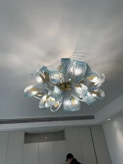 DecorBites™ blue glass LED pendant lamps with modern floral design featuring translucent petals and gold-toned accents