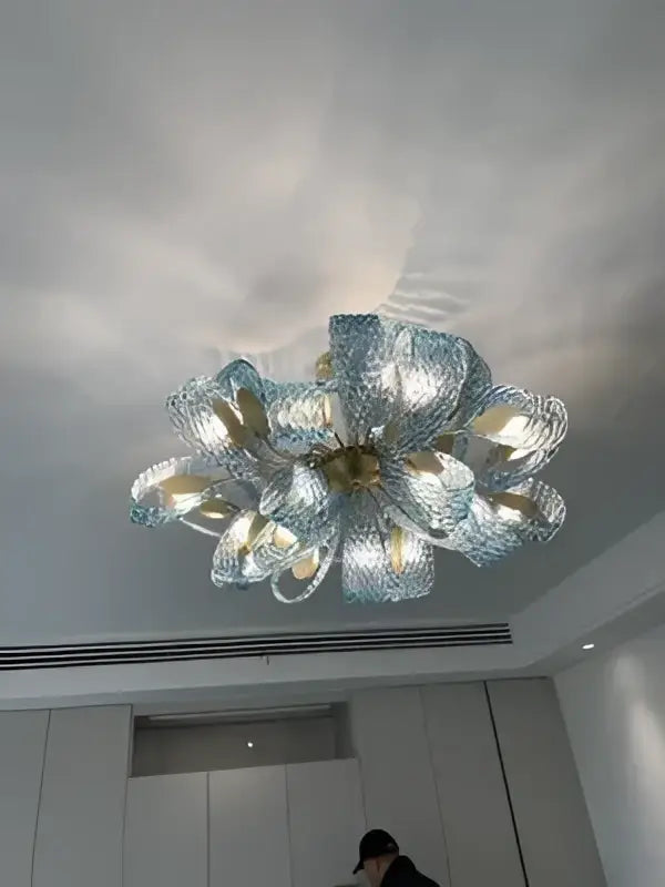 DecorBites™ blue glass LED pendant lamps with modern floral design featuring translucent petals and gold-toned accents