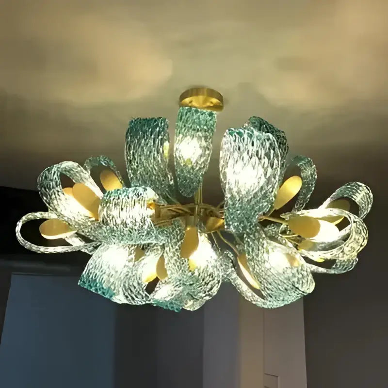 DecorBites™ blue glass led pendant lamps feature a delicate teal-green glass chandelier with woven ribbon design and gold accents