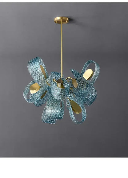 Blue glass led pendant lamps by decorbites featuring a modern sculptural design with gold accents