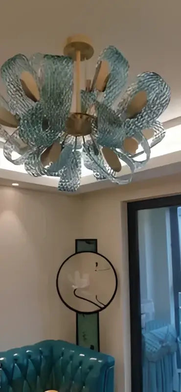 Decorbites™ blue glass led pendant lamps featuring a floral design and gold-toned central fixture for modern lighting