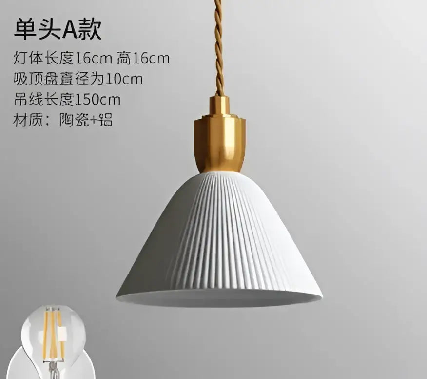 White ribbed ceramic pendant light with gold metal fixture and twisted cord complementing decorbites blue glass pendant lights