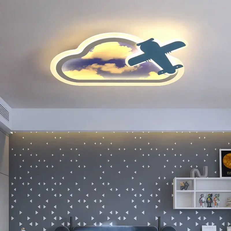 A modern decorbites blue sky airplane chandelier shaped like a cloud with warm yellow and blue dimmable lighting