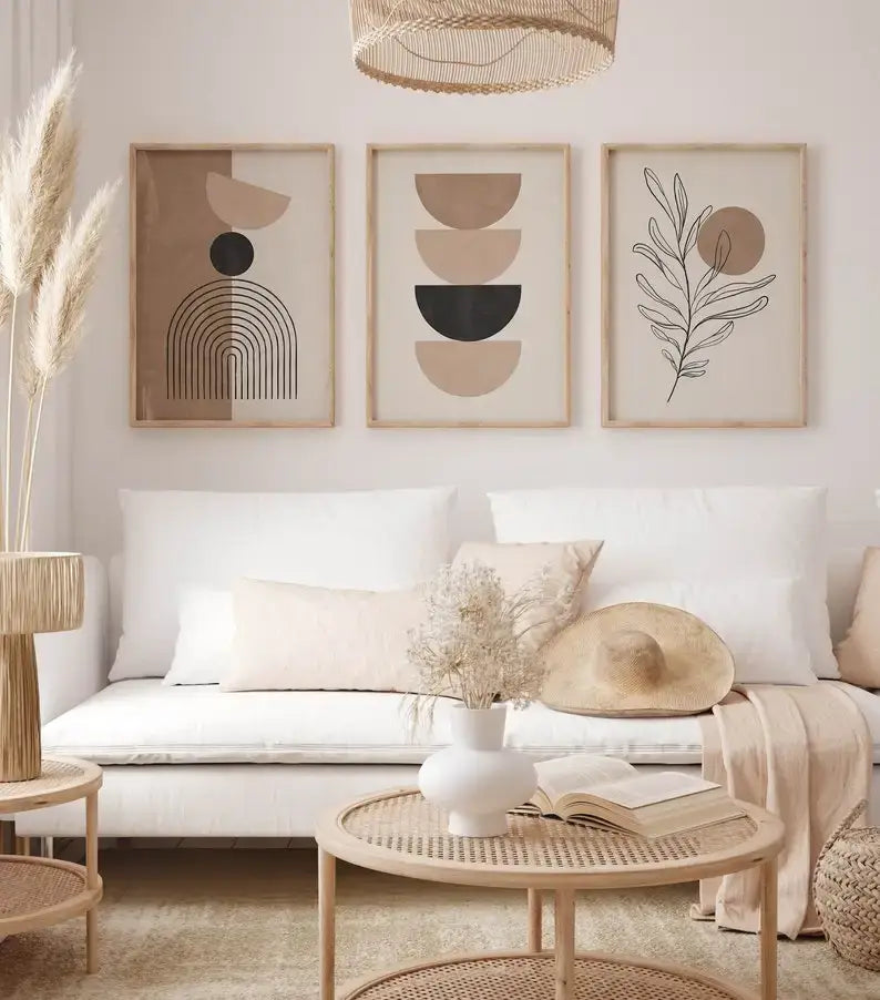 A minimalist white ceramic vase with a smooth rounded body featured in the decorbites bohemian geometric wall art set