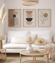 White ceramic vase with smooth rounded body and narrow neck featured in decorbites™ bohemian geometric wall art set