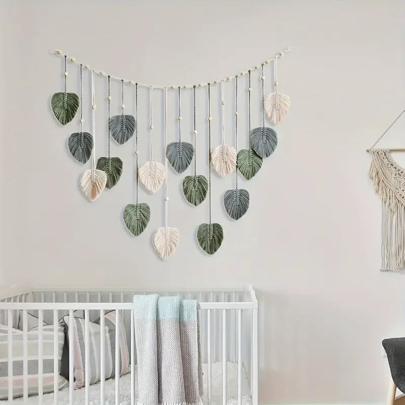 Boho style handmade tapestry macrame leaf wall hanging in soft green gray and cream tones for living room decor