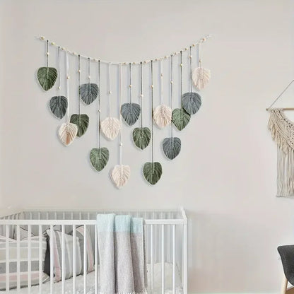 Boho style handmade tapestry macrame leaf wall hanging in soft green gray and cream tones for living room decor