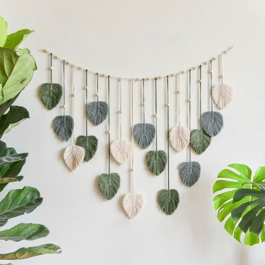 DecorBites™ boho style handmade tapestry with green and cream macrame leaves on wood dowel for living room decor