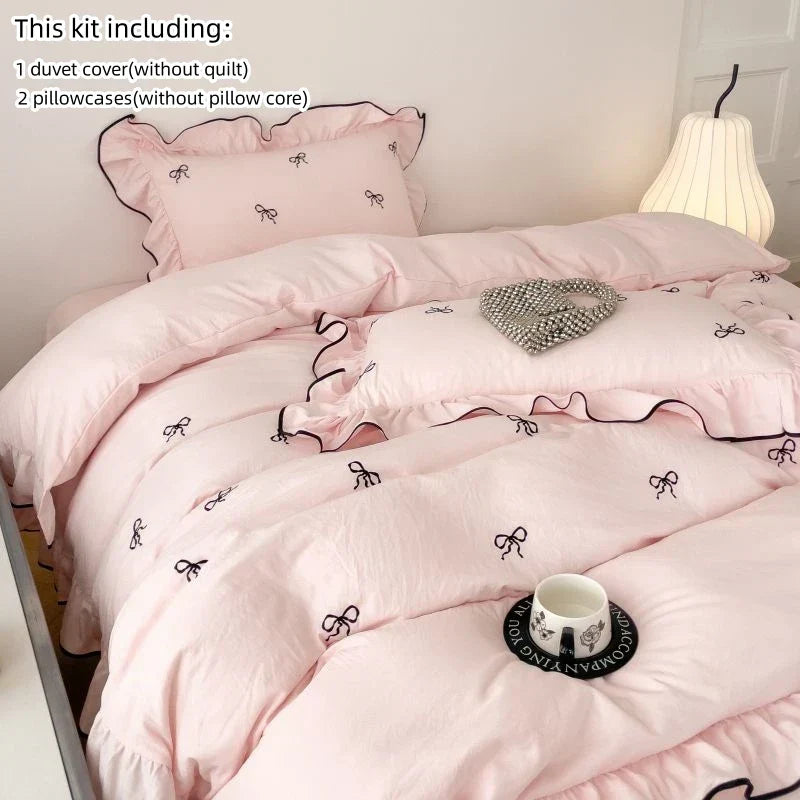 Pink duvet cover from decorbites™ bow embroidery bedding set with black ribbon bow embroidery and ruffled edges