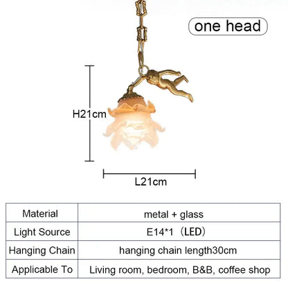 Delicate decorbites brass angel chandelier with gold-toned finish, flower glass shade, and ornate cherub for living room