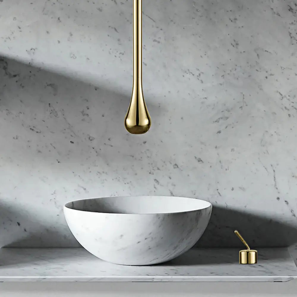 Decorbites™ brass black luxury bathroom faucet single handle with gold-toned teardrop design and polished finish