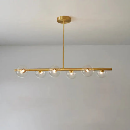 DecorBites brass island pendant ceiling light with five clear glass globes for modern dining room lighting