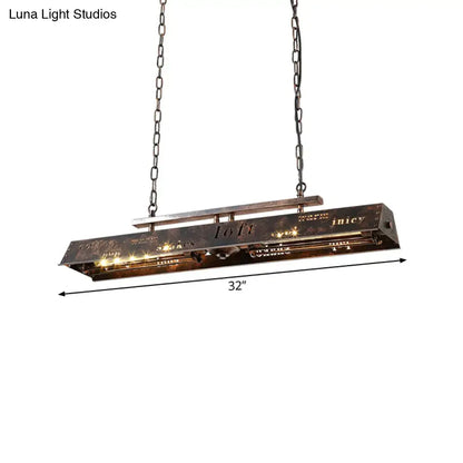Industrial-style 32-inch brass island pendant light with dark metallic finish and vintage etched typography design